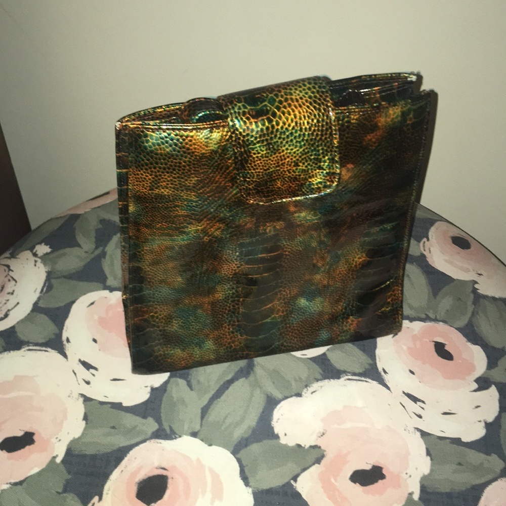 Paul Melia’s leather clutch purse
